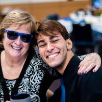A student posing with his donor.
